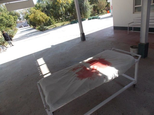 After a mass casualty management, a blood-stained stretcher left outside the door of the OPD of our Surgical Centre in Lashkar-gah, Afghanistan