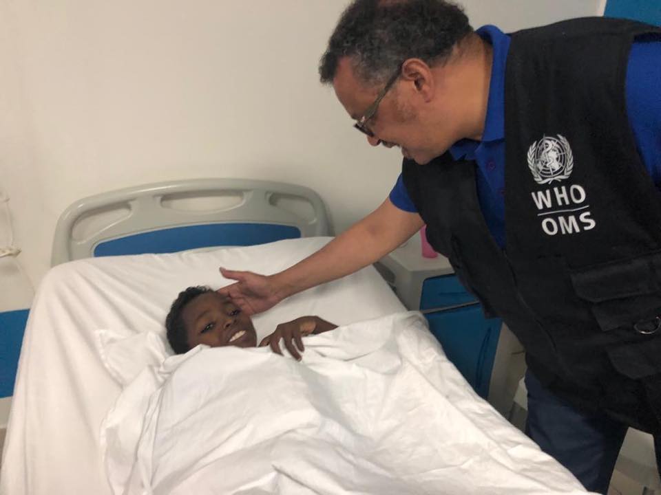 WHO's Director-General with a patient during his visit at EMERGENCY' Salam Centre